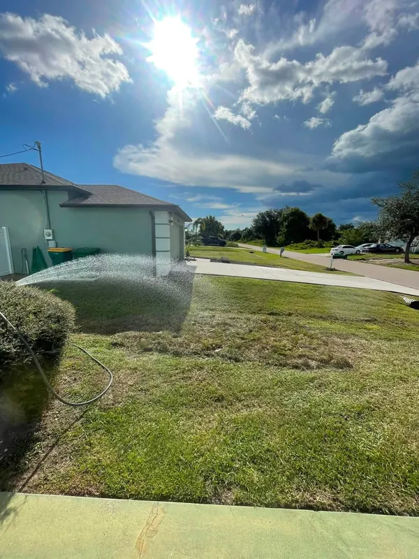 Sprinkler watering newly installed sod