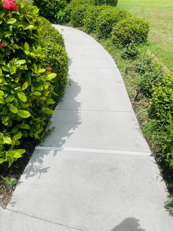 Same side walkway clean after pressure washing